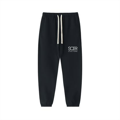 The Essentials Cotton Sweatpants in Black – Front View