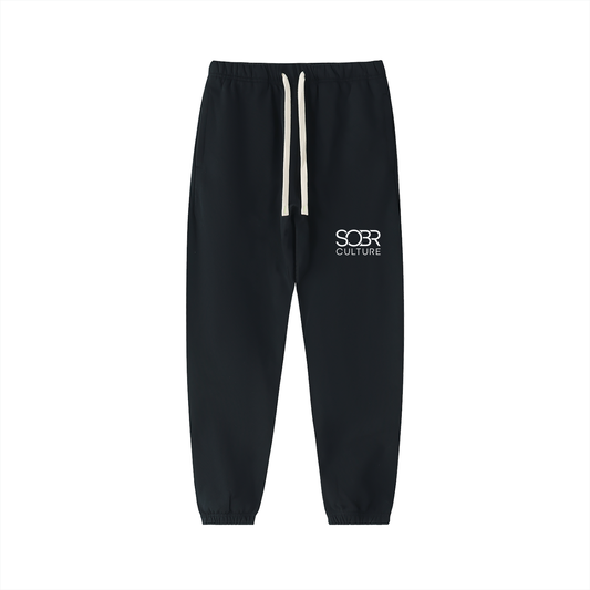 The Essentials Cotton Sweatpants in Black – Front View